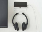 壁に取り付け可能なスマートフォンとヘッドホンを収納するスチール製ホルダー