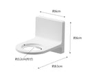白いトイレシートが装着されたトイレと、バスルームに設置された【MIST/ミスト】フィルムフックディスペンサーホルダー