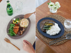 食卓に置かれたサクザン Saraオーバルプレートに盛られたご飯と野菜